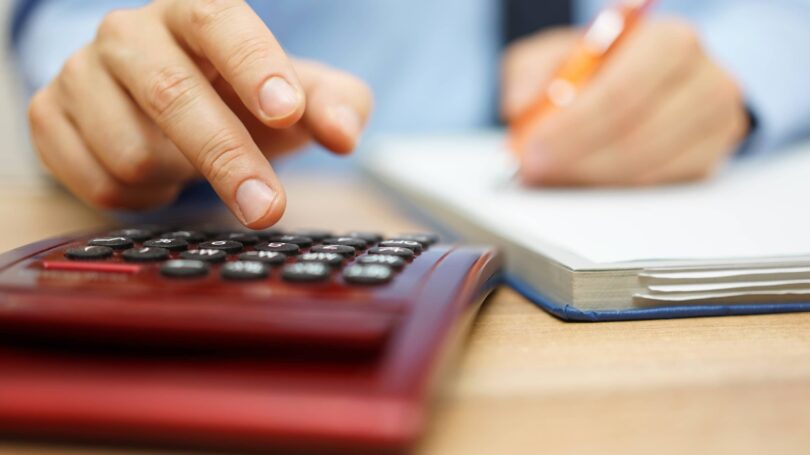 Calculating Man Pen Notebook Table